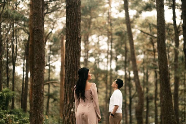 Wedding ring resting on a bouquet in grass